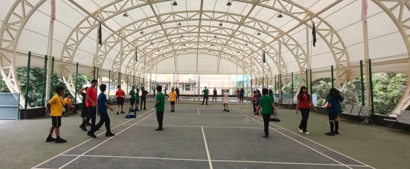 Building coordination, precision, and teamwork through Badminton.