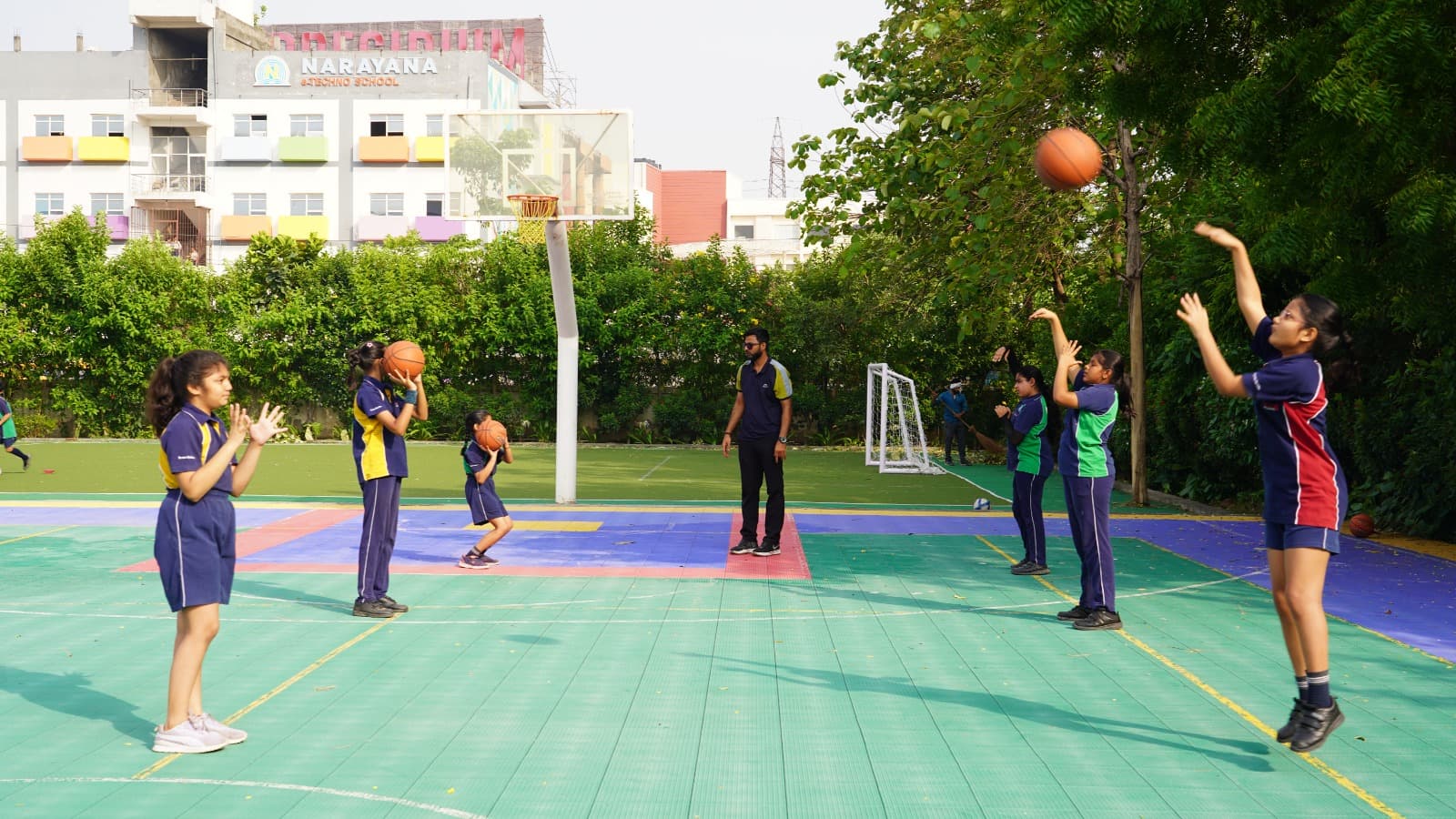 Building skill, coordination, and teamwork through Basketball.
